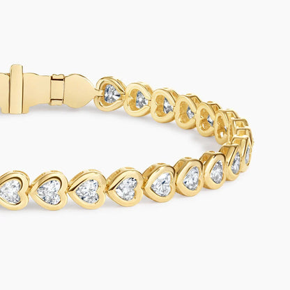 Heart Shaped Lab Diamond Bezel Tennis Bracelet (3 1/3 ct. tw.) in 14K Yellow Gold