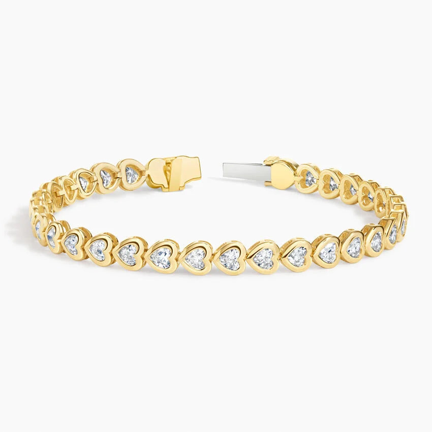 Heart Shaped Lab Diamond Bezel Tennis Bracelet (3 1/3 ct. tw.) in 14K Yellow Gold