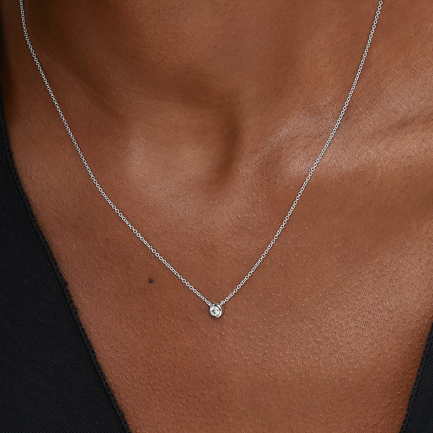 Lab Diamond Bezel Solitaire Pendant (1/10 ct. tw.)